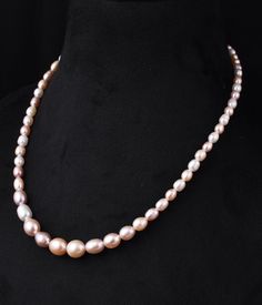 "Natural Freshwater Pearl Necklace Pink-Grading Pearl Necklace Oval-Shaped  Length of Necklace: 16\" Size of Pearls: 4.5mm-6mm to 9mm-10.5mm Weight of Necklace: 21.3g FOR FURTHER QUERIES CONTACT us." Jewellery Pearl, Pink Pearl Necklace, Pearl Necklace Designs, Pearl Jewellery, Freshwater Pearl Necklace, Women Necklace, Necklace Pearl, Wedding Jewellery Necklace, Necklace Size