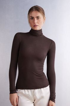 Modal Cashmere Ultralight High-Neck Top - Intimissimi Versatile Second-skin Fit Top, Brown Fine Knit Turtleneck Top, Versatile Stretch Turtleneck For Layering, Versatile High Stretch Turtleneck, Stretch Fine Knit Mock Neck Top For Layering, Second-skin High Neck Top For Fall, Solid High Neck Fine Knit Top, Brown Stretch Turtleneck Tops, Stretch Fine Knit Turtleneck For Layering