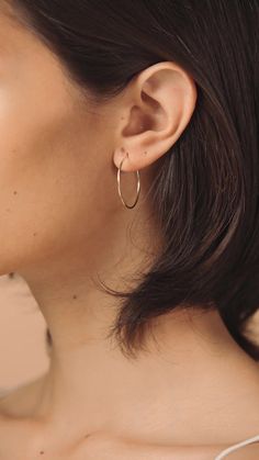 Our large gold hoop earrings are dainty and classic, making them perfect for everyday wear. Hoops measure at 30mm Delicate Everyday Hoop Jewelry, Delicate Tarnish Resistant Hoop Earrings For Everyday, Delicate 14k Gold Filled Hoop Earrings For Everyday, Delicate Gold Hoop Earrings For Everyday, Delicate Round Hoop Earrings For Everyday, Classic Small Hoop Earrings In 14k Gold Filled, Minimalist Hoop Earrings For Everyday Elegance, Rose Gold 14k Gold Filled Hoop Earrings, Delicate Everyday Nickel Free Hoop Earrings