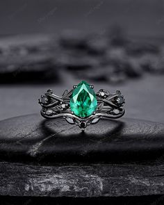 Rhodium black engagement ring like no other. This AMAZING piece of fine jewelry is the perfect expression of your eternal love. Its BLACK colors bring out the beauty of this ring. Black gold finish pear cut emerald engagement ring set, rhodium black teardrop emerald bridal set, gothic anniversary ring, witchy black plating emerald promise ring gift for women, mom, best friend, girlfriend and wife. ★Description Main ring: *Center stone: 1.0 carat 6x8mm Pear Cut Lab Created Emerald * Material: sil Gothic Black Promise Rings, Black Emerald Jewelry For Gift, Gothic Black Promise Jewelry, Black Emerald Fine Jewelry, Black Sapphire Promise Ring, Black Solitaire Wedding Ring, Black Sapphire Ring With Accent Stones For Wedding, Black Diamond Promise Ring Fine Jewelry, Black Promise Rings With Prong Setting