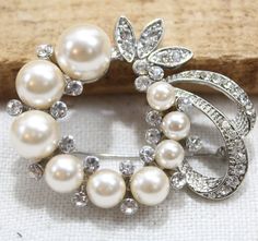 This Brooches item is sold by TheCollectaholic. Ships from Dahlonega, GA. Listed on Aug 11, 2023 Elegant Rhinestone Pins For Wedding, Rhinestone Pins For Wedding, Wedding Pins With Rhinestones, Wedding Brooches With Rhinestones, Costume Jewelery, Pin Backs, Vintage Costumes, Modern Jewelry, Faux Pearl