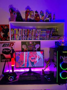 a desktop computer sitting on top of a desk in front of a book shelf filled with books