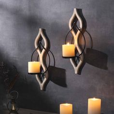 PRICES MAY VARY. WHITE BLACK CANDLE SCONCE- Add an eye-catching look to any space with Hollow flower shape pair of wall sconce candle holders. Any combination of shapes is possible.It measures 15.8inch X 6.3inch ,Disc diameter 2.95 inch MATERIAL-Our candle sconce is made of wood with metal, hard, not easily deformed. You can use it for a long time with no special maintenance is required.It shows a variety of styles and perfect decor for the any room. Such as living room, bedroom, bathroom, dinin Candle Holders Wall, Wall Mounted Candle Holders, 2 Candle, Black Candle, Wood Candle, Metal Welding, Wood Candle Holders, Candle Wall Sconces, Black Candles