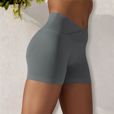 The Anna-Kaci Women's High Waist Seamless Ribbed Biker Shorts are a stylish and functional addition to your activewear collection. Made from soft, stretchy ribbed fabric, these biker shorts feature a high waist design that provides excellent support and a flattering fit. The seamless construction ensures maximum comfort and freedom of movement, making them perfect for workouts, yoga sessions, or casual wear. Pair these versatile shorts with a crop top, sports bra, or oversized tee for a chic and Seamless Athletic Shorts For Sports, High Stretch Seamless Yoga Shorts, Compressive Athletic Shorts For Gym In Gray, High Stretch Functional Athletic Shorts, Compressive Gray Athletic Shorts For Gym, Functional High Stretch Solid Athletic Shorts, Gray Compressive Athletic Shorts For Gym, Stretch Moisture-wicking Seamless Shorts, High Stretch Moisture-wicking Solid Athletic Shorts