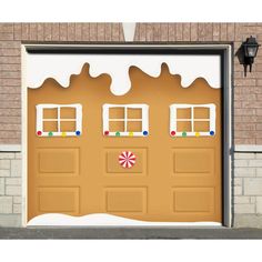 an image of a gingerbread house on the garage door