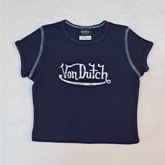 Brand New Without Tags Attached Size : 3t * Measurements Are Attached Color : Blue With White Lettering Please See All Attached Pictures For Any Additional Details Trendy Navy Top With Letter Print, Navy Tops With Letter Print For Spring, Fitted Blue Tops With Logo Print, Navy Cotton Top With Letter Print, Navy Cotton Tops With Letter Print, Fitted Navy T-shirt For Spring, Von Dutch Shirt, Dutch Blue, Von Dutch