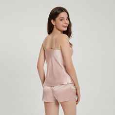 100% 19 Momme Mulberry Silk (High Grade 6A) Thread Count:400 Fashionable V-neck design Size:XS, S, M, L, XL Color: Charming Pink Silky,Comfortable,Anti-Allergic,Skin-Friendly THXSILK's matching pajama camisole set is the most stylish and lightweight out there, and the camisole pairing is really very much and hot sleeper. The silk fabric feels luxurious and the overall fit is casual, so you won't get hooked up if you wear it for any length of time. The stitching and structure of the neckline of t Chic V-neck Sleep Camisole, Feminine Camisole Top, Solid V-neck Sleepwear For Summer, Pink Sleeveless Camisole For Loungewear, Pink Sleeveless Sleep Camisole, Feminine V-neck Camisole For Loungewear, Casual Pink Sleep Tank Top, Chic Pink Summer Sleepwear, Pink Summer Camisole For Loungewear