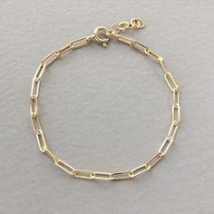 Rectangle Chain Bracelet Paperclip chain Bracelet Yellow | Etsy Delicate Chain Link Bracelets As Gift, Elegant Metal Paperclip Bracelets, Delicate Oval Link Chain Bracelets As Gift, Delicate Chain Link Bracelet As Gift, Gift Bracelet With Delicate Oval Link Chain, Delicate Chain Bracelet With Oval Links For Gifts, Delicate Oval Link Chain Bracelet As Gift, Paperclip Chain Gold Bracelet As Gift, Rectangular Paperclip Bracelet With Lobster Clasp