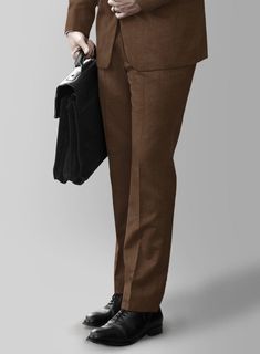 Devise a modish style statement by wearing our Huddersfield Stretch Brown Wool Pants, ensuring you stay at the forefront of style. Exquisitely fashioned from a wool blend fabric, this ensemble boasts an earthy brown tone, meticulously dyed into a solid texture, adding an undeniable poise and flair to your look, allowing you to confidently wear it to various occasions, such as parties, receptions, weekend meetings, and even on workdays. 
  Introducing "Voyager" collection, a truly exceptional fabric that combines luxury and performance. Crafted from super 100's australian merino wool fiber with touch of lycra for flexibility and resillience is enriched with prunelle weave that ensures a lively draping and crease resistance feature. 
  Look Includes     Huddersfield   Stretch   Brown   Wool Brown Wool Suit, Brown Wool Pants, Wolverine Leather Jacket, Mint Green Jacket, Tweed Overcoat, Dapper Suits, Double Breasted Overcoat, Solid Texture, Tweed Pants