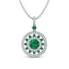 This gorgeous medallion necklace features a round design, sparkling with round-cut white lab-created sapphires. Vivid round-cut lab-created emeralds dance throughout to finish the beautiful look. The pendant hangs from an 18-inch cable chain and secures with a lobster clasp. Dazzling Round Emerald Necklace, Dazzling Round Emerald Necklace For Anniversary, Halo Setting Jewelry With Round Stone For May Birthstone, Diamond Round Pendant Necklace For May Birthstone, Classic Emerald Necklace With Diamond Accents, Anniversary Emerald Necklace With Diamond Accents, Round Emerald Necklace With Diamond Accents For Anniversary, Classic Round Emerald Necklace With Diamond Accents, May Birthstone Necklaces With Diamond Accents