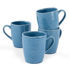 four blue mugs stacked on top of each other