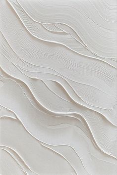 an abstract white wallpaper with wavy lines on the bottom, and one line in the middle