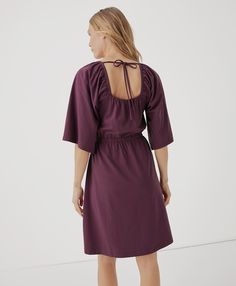 Women's Maroon Luxe Jersey Flutter Sleeve Dress 2XL. Super soft organic women's Luxe Jersey Flutter Sleeve Dress from Wear PACT. Fair Trade Factory. GOTS Certified Made With Organic Cotton Feminine Midi Dress With Butterfly Sleeves, Chic Dress With Ruffle Hem And Butterfly Sleeves, Chic Mini Dress With Butterfly Sleeve And Ruffle Hem, Casual Butterfly Sleeve Dress With Ruffle Hem, Ruffle Sleeve Dress With Smocked Back For Daywear, Spring Dresses With Gathered Flutter Sleeves, Butterfly Sleeve Mini Dress With Ruffle Hem, Casual Flowy Dress With Butterfly Sleeves, Chic Brunch Mini Dress With Gathered Neckline