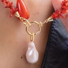 Baroque means ‘irregularly shaped’ and like our luxuriant earrings - there is nothing regular about your beauty! This minimalist piece needs nothing other than your gorgeous spirit to charm ‘em all! Chic Handmade Teardrop Jewelry, Chic Pearl Drop Pendant Jewelry, Modern Baroque Pearl Jewelry As Gift, Elegant Freeform Natural Stones Necklace, Elegant Coral Jewelry For Gift, Chic Teardrop Jewelry Gift, Elegant Freeform Necklace For Gifts, Elegant Baroque Pearl Jewelry, Elegant Necklace For Gift