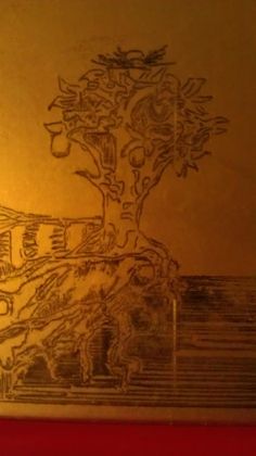 a drawing of a tree on the wall