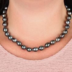 A necklace of cultured South Sea Tahitian pearls, graduated in size, are sure to add natural grace to any outfit. Closes with ball shaped pearl clasp. Due to the unique nature of pearls, shade of color, shape or texture, may vary slightly from photo. Tahitian Pearl Necklace With High Luster Round Beads, Single Strand Tahitian Pearl Jewelry With Round Beads, Silver Single Strand Tahitian Pearl Necklace, Black Tahitian Pearl Single Strand Jewelry, Black Tahitian Pearl Single Strand Necklace, Pearl Clasp, Pearl Strand, Unique Nature, South Seas