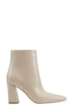 Boasting a clean-lined, sleek silhouette with a modern square toe and tapered block heel, this versatile leather bootie is a go-to cool-weather look. 3 1/2" heel(size 8.5) 4 3/4" shaft Leather upper/synthetic lining and sole Imported Modern Calf Leather Heeled Boots With Block Heel, Modern Calf Leather Block Heel Boots, Chic Square Toe Boots With Heel Tab, Modern Business Boots For Spring, Sleek Boots With Branded Heel Counter And Square Toe, Sleek Square Toe Boots With Branded Heel, Modern Calf Leather Heeled Boots For Spring, Elevated Fashion, Dress Lining