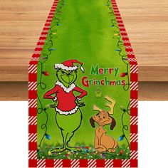 a christmas table runner with the grin on it