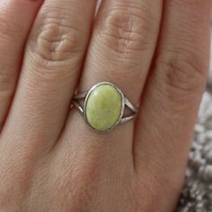 This one of a kind Scottish Green Marble ring has been handmade of 925 Sterling Silver in our workshop. Please select the size and you will receive exactly the same ring as presented in the photos of the listing. Scottish Green Marble was formed over 600 million years ago when molten volcanic rock pushed up from deep inside the earth through the overlying limestone. The area these stones are found is one of the most remote parts in the Highlands and Islands. In Scotland this beautiful stone has Minimalist Natural Stones Open Ring Jewelry, Handmade Classic Stackable Rings, Vintage Everyday Jewelry With Polished Finish, Everyday Vintage Jewelry With Polished Finish, Nickel-free Sterling Silver Open Band Ring, Everyday Sterling Silver Gemstone Jewelry, Everyday Silver Nature-inspired Jewelry, Elegant Hallmarked Sterling Silver Turquoise Ring, Elegant Hallmarked Turquoise Ring In Sterling Silver