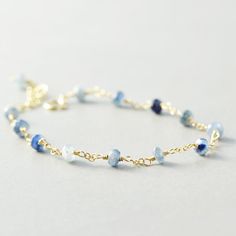 Sapphire Bracelet, Navy Blue Bracelet, September Birthstone, Denim Blue Cheap Blue Bracelets With Gold Beads, Dainty Blue Faceted Beaded Bracelets, Blue Gemstone Bracelets For Everyday Wear, Blue Gemstone Beads Bracelet For Everyday, Dainty Blue Bracelets With Faceted Beads, Everyday Blue Gemstone Beads Bracelets, Everyday Blue Gemstone Beads Bracelet, Dainty Blue Bracelets With Natural Stones, Blue Faceted Rondelle Bracelets