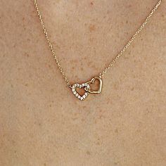 "This 14k solid gold double interlocking heart necklace, Perfect Gift for Anniversary, Birthday or any Special Occasion to show someone you love them! DETAILS 14k solid yellow gold. Pendant dimension is 16mm x 8mm Necklace length is 16\" to 18\" adjustable. Total diamonds : 14 Total 0.21 ct weight Color GH Clarity SI --------------------- HOW TO FIND OUT YOUR NECK SIZE ! Measure around your neck. Choose a place where you would you wear your necklace. To take the measurement, use a piece of strin Rose Gold Heart Necklace With Adjustable Chain For Anniversary, Dainty Heart Necklace For Valentine's Anniversary, Anniversary Rose Gold Heart Necklace With Adjustable Chain, Adjustable Heart-cut Necklace For Anniversary, Double Heart Necklaces With Adjustable Chain For Anniversary, Double Heart Jewelry For Valentine's Anniversary, Heart Cut Necklace With Adjustable Chain For Anniversary, Dainty Double Heart Necklace For Anniversary, Anniversary Double Heart Necklace With Adjustable Chain