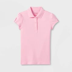 Stock up on wardrobe essentials for your kiddo with this Uniform Interlock Polo Shirt from Cat and Jack™. Made from a smooth interlock fabric, this uniform polo shirt keeps them moving through the day in cool comfort. Fashioned in a solid hue and featuring a classic polo design with a collared neckline and a three-button placket for a dressier look, this interlock polo shirt has subtle puff short sleeves with a button tab for a touch of flair. Easy to coordinate with a variety of bottoms for ver Casual Short Sleeve Polo Shirt For School, Fitted Casual Polo Shirt For School, Classic Fitted School T-shirt, Spring Solid Color Polo Collar T-shirt, Basic School Polo Shirt, Basic Short Sleeve Cotton Polo Shirt, Fitted Short Sleeve Polo Shirt For School, Classic Short Sleeve Polo Shirt For School, Basic Cotton Short Sleeve Polo Shirt