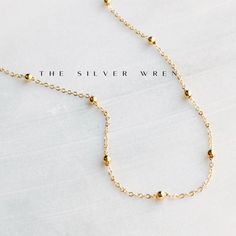 This dainty gold chain necklace, perfect for layering or a minimalist look. •18kt gold plated -lead, nickel & cadmium free•Heavy plating, tarnish resistant, water friendly Everyday 14k Gold-filled Necklaces With Tiny Beads, Everyday 14k Gold Filled Tiny Beads Necklace, Everyday 14k Gold-filled Necklace With Tiny Beads, Everyday 14k Gold Filled Necklace With Tiny Beads, Minimalist Tiny Beads Chain Necklace For Everyday, Minimalist 14k Gold Filled Round Bead Necklaces, Everyday 14k Gold Filled Beaded Chain Necklace, Dainty Ball Chain Necklace For Everyday, Minimalist 14k Gold-filled Beaded Necklace As Gift