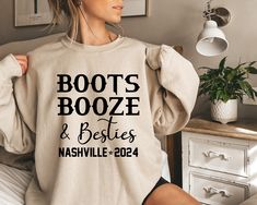 Nashville Sweatshirt, Nashville Girl Trip Sweatshirt, Custom Besties Tshirt, Boots Booze and Besties Sweatshirt,  Bachelorette Sweatshirt We custom design, print, and hand press, and carefully ship everything you see in our shop. All of our items are printed on quality apparel. It feels soft and lightweight, with the right amount of stretch. It is comfortable and flattering for Women, Men, and babies. 👕 GILDAN 18000 SWEATSHIRT 📌8 oz./yd² (US) 13.3 oz./L yd (CA), 50/50 cotton/polyester, 20 sing Sweatshirt Bachelorette, Girl Trip, Girls Trip, Fleece Fabric, Nashville, Sweat Shirt, Gender Neutral, Adult Outfits, The Selection