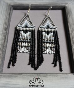 These gray and black fringe beaded earrings are made of high-quality Czech beads and strong synthetic thread. They are elegant, fashionable, and highly versatile, suitable for everyday wear. Features: Sterling silver components Color: gray, white, black. This item is currently in stock. You must be completely satisfied. If you find merchandise unsatisfactory for any reason, return it within 10 days and your money will be refunded without questions. These earrings in gold color https://www.etsy.c Black Bohemian Tassel Earrings With Round Beads, Bohemian Black Tassel Earrings With Round Beads, Black Beaded Fringe Tassel Earrings As Gift, Black Beaded Earrings With Tassels, Black Beaded Tassel Earrings With Round Beads, Black Tassel Drop Earrings With Colorful Beads, Black Fringe Earrings With Round Beads, Black Beaded Fringe Dangle Tassel Earrings, Black Beaded Fringe Earrings With Round Beads