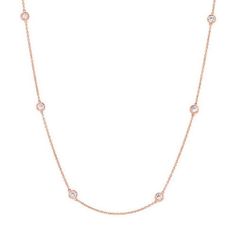 Metal Type: 14K Rose Gold Metal Weight: 3.42 grams Diamond Carat Weight: 0.5 carats Diamond Setting: Bezel Setting Number of Diamonds: 10 round diamonds Necklace Length: 18 inches This stunning necklace is crafted in 14K rose gold with a gross weight of 3.42 grams. The necklace features ten round diamonds, each securely set in a bezel setting. The bezel setting not only enhances the visual appeal of the diamonds but also ensures their protection. With a length of 18 inches, this necklace is desi Dazzling Rose Gold Diamond Necklace With 17 Jewels, Anniversary Rose Gold Diamond Necklace With Brilliant Cut, Rose Gold Diamond Necklace With Bezel Setting, Rose Gold Round Cut Diamond Necklace With Bezel Setting, Classic Rose Gold Diamond Necklace With Round Cut, Cubic Zirconia Rose Gold Necklace For Anniversary, Classic Rose Gold Necklace With Diamond Accents, Rose Gold Cubic Zirconia Diamond Cut Necklace, Rose Gold Diamond Necklace With Bezel Setting For Anniversary