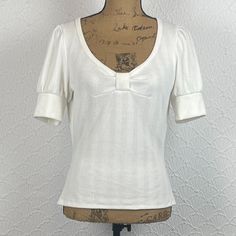 Bundle Discounts On Multiple Items Fast Shipping Sustainable Business Poshmark Embassador New Without Tags! Fitted Retro Cream Top, Retro Cream Top For Spring, Retro Cream Tops For Spring, Vintage Cream Tops For Day Out, Retro Fitted White Top, White Fitted Retro Top, Classic Cream Puff Sleeve Tops, Vintage Cream V-neck Top, Vintage Cream Puff Sleeve Tops