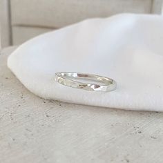 The gorgeous Hammered Fortune ring, this ring is perfect for stacking with other rings or wearing solo.  Crafted by hand with quality sterling silver and hammered texture making each ring unique. Comes gift ready in a beautiful Lush n Luxe Jewellery pouch. Listing is for one ring. Approximately 2mm thick Handmade in my Jewellery studio in Perth, Western Australia.  (colour may vary slightly due to being viewed on a mobile screen/monitor) Any questions get in touch. Be sure to follow along on my socials for more!  www.instagram.com/lush_n_luxe www.facebook.com/lushnluxe www.lushnluxe.com.au   Gemma xo Silver Hammered Ring, Jewellery Studio, Handmade Silver Jewellery, Jewellery Pouch, Hammered Silver Ring, Hammered Ring, Luxe Jewelry, Hammered Rings, Simple Ring