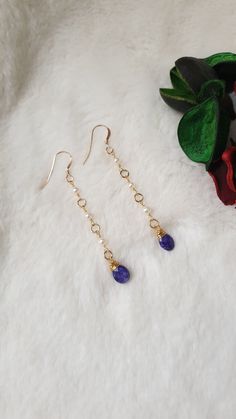 This earrings are made with natural freshwater pearls (3-4) mm, Raw Sapphire briolette, 14k gold filled links and 14k gold filled hoops.  The length of the earrings including the hoop is approximately 6 cm. Please contact me in case you have any questions. 14k Gold-filled Teardrop Pearl Chain Jewelry, 14k Gold Dangle Linear Earrings With Pearl Drop, Everyday 14k Gold Filled Long Drop Pearl Earrings, Elegant Wire Wrapped Briolette Teardrop Earrings, 14k Gold-filled Long Drop Pearl Earrings, Dainty Teardrop Earrings With 14k Gold Filled, Dainty 14k Gold-filled Teardrop Earrings, 14k Gold Linear Dangle Earrings With Pearl Drop, Minimalist 14k Gold Filled Teardrop Dangle Earrings