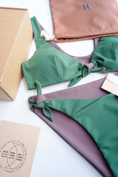 Reversible bikini set, XS size in green +taupe color, 6 in 1 design- color combinations to wear it. "Celine" top with soft cups and comfy ajustable bikini. Eco Sun Day all swimwear made from sustainable fabric which is made from recycled ocean plastic and fishing nets. Composition- 78% Recycled PA + 22% EA. Ethycally made in Lithuania Ready to ship, sending same day! In case You would like to oder this set in other size or color , chek this made to oder item: https://www.etsy.com/listing/1294174 Green Bra-friendly Tie-side Swimwear, Green Tie-side Bottom Swimwear, Bra Friendly, Celine Top, Sun Day, Fishing Nets, Sustainable Fabric, Sustainable Swimwear, Reversible Bikinis, Soft Cup