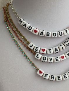 "Fun customized name/words necklace. Wear it with day outfit or nigh outfit and layered with other necklaces. You can order in large quantities for a party/event as special customize gifts. The letters are made out of square plastic beads . Size about 5mm The chain is a crystals✨ Swarovski ✨, comes in 4 colors. Chain width about 1.5mm The Swarovski chain gives sparkling affect and make it unique. Please choose at chain color at Finish menu: Crystal clear - silver tone metal Aqua blue - gold tone Trendy Personalized Charm Necklaces For Birthday, Trendy Personalized Charm Necklace For Birthday, Trendy Personalized Charm Necklace Gift, Customizable Trendy Necklaces For Birthday, Customizable Trendy Necklace For Birthday, Trendy Customizable Necklaces For Birthday, Trendy Customized Necklace For Birthday, Trendy Name Necklace For Mother's Day, Customizable Trendy Necklaces For Personalized Gifts