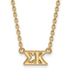 a gold necklace with the letter k on it