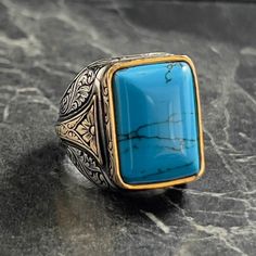 Square Turquoise Blue Gemstone Silver Ring , Genuine Blue Stone Ring , Handmade Flower Patterned Men's Ring , Handmade Jewelry , Gift for Him , Same Day For Shipping ✧ Product Details * Handmade İtem * Gender : Male / Female * Material : 925K Sterling Silver * Ring Weight : 15 Grams * Gemstone Type : Turquoise Blue ✔ Usage Details * Silver jewelry is very sensitive to chemicals. It is recommended to keep away from chemical substances such as cream, bleach, deodorant, detergent. * Silver jewelry can also darken quickly in salt water, that is, in sea water. For this reason, it is best to remove them when swimming in the sea. ✔ Shipping * Your orders placed on weekdays are delivered to the cargo on the same day. Your orders placed on the weekend are delivered to the cargo on Monday. ✔ Other D Blue Turquoise Ring With Large Stone For Anniversary, Handmade Turquoise Rectangular Rings, Anniversary Blue Turquoise Ring With Large Stone, Adjustable Blue Rings With Large Stone, Bohemian Blue Turquoise Ring With Stones, Blue Rectangular Spiritual Jewelry, Spiritual Blue Rectangular Jewelry, Blue Turquoise Ring For Jewelry Making, Blue Rings With Natural Stones For Jewelry Making