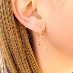 Solid 14K rose gold spiral earrings. Comes as a pair with a right and left side.•• Nickel free ••• Handmade out of 20 gauge round wire.• Approximately 1.5 inches long. • • • Each 14K piece of jewelry is stamped 14K for authenticity.• Also available in 14K yellow gold & 14K white gold (white gold has trace amounts of nickel, but is rhodium plated for brightness).• These are threader earrings, and traditionally don't require earring backs. But for those with active lifestyles, and if you like a se Hypoallergenic 14k Rose Gold Earrings, Hypoallergenic Rose Gold 14k Earrings, Minimalist Rose Gold Spiral Jewelry, Modern Wrap Earrings For Pierced Ears As Gift, Rose Gold Pierced Earrings 14k Gold Filled, Rose Gold 14k Gold-filled Pierced Earrings, Modern Twist 14k Gold Earrings, Rose Gold Sterling Silver Wrap Earrings For Gifts, Modern Twist 14k Rose Gold Jewelry