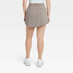 Why we're ALL IN: Woven mid-rise skort with built-in shorts in a regular-fit silhouette makes a cool choice for your active days. Moisture-wicking, quick-dry lightweight fabric helps you stay cool, while a drawcord elastic waistband provides a snug fit. Side pocket provides hands-free convenience and the UPF 50+ rating offers sun protection. All in Motion™: Made for every move, priced for every day. Sporty Short Skort For Workout, Sporty Skort For Workout, Casual Breathable Skort For Summer, Casual Short Tennis Skirt For Gym, Casual Short Length Tennis Skirt For Gym, Sporty Short Length Skort For Sports, Sporty Short Skort For Sports, Breathable Casual Tennis Skirt For Sports, Functional Short Tennis Skirt For Sports