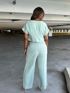 (Free shipping on all domestic orders over $100) Introducing the Kelly Set, an elegant two-piece ensemble boasting sophistication and luxury. Crafted with linen blend fabric, the short-sleevedcrop top and high-waisted, wide-leg pants with buttoned outseam exude style and class. Perfect for any occasion where you want to look and feel like a million bucks. Product Detail: -2- Piece Set: Short Sleeve Linen Crop Top & Buttoned Outseam Pants Medium-weight, Woven Linen Fabric Top:Short Sleeve Linen P Spring Day Out Sets With Short Sleeves, Cotton Short Sleeve Pant Set, Cotton Short Sleeve Matching Pant Set, Green Linen Casual Sets, Cotton Pant Set With Short Sleeves, Casual Green Linen Set, Casual Short Sleeve Pant Set For Vacation, Casual Two-piece Short Sleeve Pant Set, Casual Two-piece Set With Short Sleeves