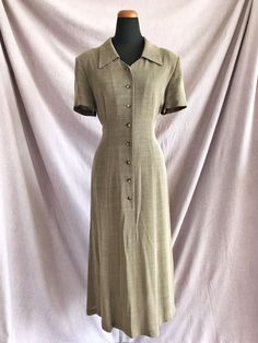 "Vintage Exelancetti Milano Brown Dress, Button Down Dress, Classic Vintage Dress, Minimalist Dress, Brown Simple Dress, Vintage Fashion ALL items have been washed with the utmost care. Item has been clipped in back of mannequin to show fit.  Please check below for real measurements. Description: -Collar -Button-down -Short sleeve -Shoulder pads Tag Info: (Brand) Exelancetti Milano (Material) 50% rayon / 25% triacetate / 25% polyester (Tag Size) 38 Measurements (measured flat): (Chest) 18\" (Waist) 16\" (Hip) 19\" (Sleeve) 7.5\" (Length) 44\" Condition: In EXCELLENT vintage condition.  NO major wear, tears or stains. &#9733 Shipping will be combined for multiple purchased items.  Shipping overage over $2 will be refunded after the order is placed.   &#9733 Please keep in mind that all item Brown Button Up Dress, Brown Vintage Dress, Button Dress Outfit, Brown Vintage Dresses, Hp Oc, Minimalist Dress, Dress Minimalist, Simple Work, Minimalist Dresses