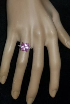 GORGEOUS  vintage 14K WHITE GOLD  engagement ring pink  sapphire in cushionl shape  center  lab grown sapphire weight 4.93carat . size 9x9mm very nice vivid pink color ,nice luster, very lively ,nice cut. clean.sparkly sapphire .side two natural old mine cut  diamonds total weight 0.35ct. Size 3.3mm H-SI1 ring size 6Resizable Appraisal available Retail value $3,750 net. Formal Pink Sapphire Rings With Cushion Cut, Pink Diamond Accented Fine Jewelry For Wedding, Formal Pink Sapphire Cushion Cut Rings, Pink Fine Jewelry For Wedding With Accent Stones, Wedding Sapphire Ring With Square-cut Accent Stones, Pink Radiant Cut Ring With Halo Setting, Square Cut Sapphire Ring With Accent Stones For Wedding, Pink Sapphire Ring With Accent Stones For Wedding, Cushion Cut Pink Sapphire Jewelry