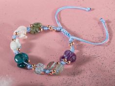 🌟 Embrace the beauty of natural gemstone jewelry with our Pisces Zodiac Bracelet! 🐟✨ We offer the highest quality and most unique jewelry pieces featuring Aquamarine, Amethyst, Moonstone, Kyanite, Blue Apatite, Purple Fluorite, and Green Larimar. Each piece is meticulously crafted by our designers, allowing you to choose the perfect match based on the colors and energies of these natural stones. Our natural gemstone jewelry effortlessly complements any fashion style, making it a perfect access Adjustable Aquamarine Bracelets With Natural Stones, Aquamarine Bracelet Jewelry Gift, Adjustable Aquamarine Beaded Bracelet With Natural Stones, Handmade Adjustable Aquamarine Bracelet, Aquamarine Bracelet Jewelry As A Gift, Adjustable Aquamarine Beaded Bracelets With Natural Stones, Adjustable Aquamarine Beaded Bracelet As Gift, Adjustable Aquamarine Beaded Bracelets As Gifts, Adjustable Aquamarine Bracelet