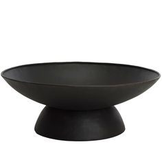 a black bowl sitting on top of a table