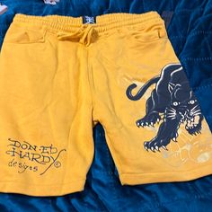 New Ed Hardy Cotton Shorts With Drawstring, Side Pockets And Back Pockets. Original Tags Attached And Never Worn. Casual Yellow Bottoms For Loungewear, Yellow Leisure Bottoms For Summer, Casual Yellow Shorts For Leisure, Casual Yellow Shorts For Loungewear, Casual Yellow Loungewear Bottoms, Yellow Casual Shorts For Loungewear, Yellow Bottoms With Elastic Waistband For Streetwear, Yellow Relaxed Fit Bottoms For Streetwear, Yellow Shorts With Pockets For Streetwear