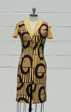 A modern take on classic style using African fabric.  The fabric is 100% cotton and we will create a custom dress with your supplied measurements. Fitted Cotton V-neck Mini Dress, Short Sleeve Mini Dress With Fitted Bodice, Lined Mini Dress With Fitted Bodice And Short Sleeves, Fitted Bodice Mini Dress With Short Sleeves And Lining, Vintage Fitted V-neck Midi Dress, Fitted Vintage Dress For Semi-formal Occasions, Summer Dress With Fitted Bodice And Cap Sleeves, Fitted Cotton Mini Dress For Casual Wear, Fitted Cap Sleeve Midi Dress For Formal Occasions