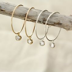 ☆ ☆ Tiny CZ Hoop Earrings ☆ ☆ ❤ The perfect gift for that special loved one ❤ PRODUCT INFO * This listing is for 1 pair of cubic zirconia hoop earrings * Our products are handmade with top quality 925 Sterling Silver & 14k Gold Filled materials * Available in sterling silver OR 14k gold filled * The hoops are 2cm  * The cz charms measure to 4mm GIFT WRAPPING * Each piece will include gift wrapping ❤ We may package multiple products within one box or bag to try prevent excess waste as much as pos Hoops With Stones, Hoop Earrings With Charm, Double Horn Necklace, Cubic Zirconia Hoop Earrings, Gold Chain Choker, Black Velvet Choker, Engagement Rings Affordable, Gold Filled Hoops, Black Diamond Ring Engagement