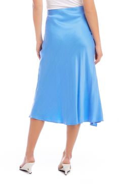 A vibrant solid hue emboldens this wrapped skirt tethered with a defining side tie. 33" length (size Small) True wrap style with side tie closure Unlined 53% cupro, 47% viscose Dry clean Made in the USA of imported fabric Elegant Blue Asymmetrical Skirt, Fitted Blue Asymmetrical Wrap Skirt, Elegant Blue Wrap Skirt, Blue Silk Lined Skirt, Blue Silk Lined Bottoms, Blue Silk Relaxed Skirt, Blue Silk Relaxed Skirt Bottoms, Blue Flowy Flared Wrap Skirt, Blue Flared Flowy Wrap Skirt