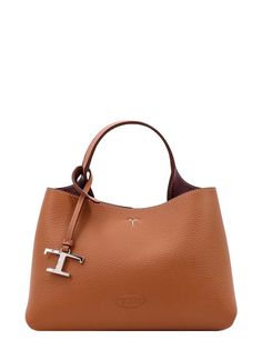 Dimensions: Width: 22.5cm, Height: 18.5cm, Depth: 15.5cm, Strap: 55.5cm, Handle: 10.5cm 100% Calf Leather Made in Italy Designer Model Number: XBWAPAEL000QRI Designer Colour: 9P13 Tods Bag, Leather Mini Bag, Micro Bag, Stylish Logo, Timeless Wardrobe Staples, Metal Detail, Brown Handbag, Mini Tote Bag, Mini Crossbody Bag