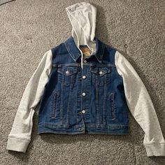 Jean Jacket With Gray Sleeves & Gray Hoodie. Never Worn Before. Levi's Hooded Spring Outerwear, Levi's Hooded Outerwear For Spring, Levi's Casual Hooded Outerwear, Levi's Casual Blue Outerwear, Casual Blue Levi's Outerwear, Dark Denim Shirt, Trucker Jacket Women, Levi Jean Jacket, Jean Jacket Hoodie